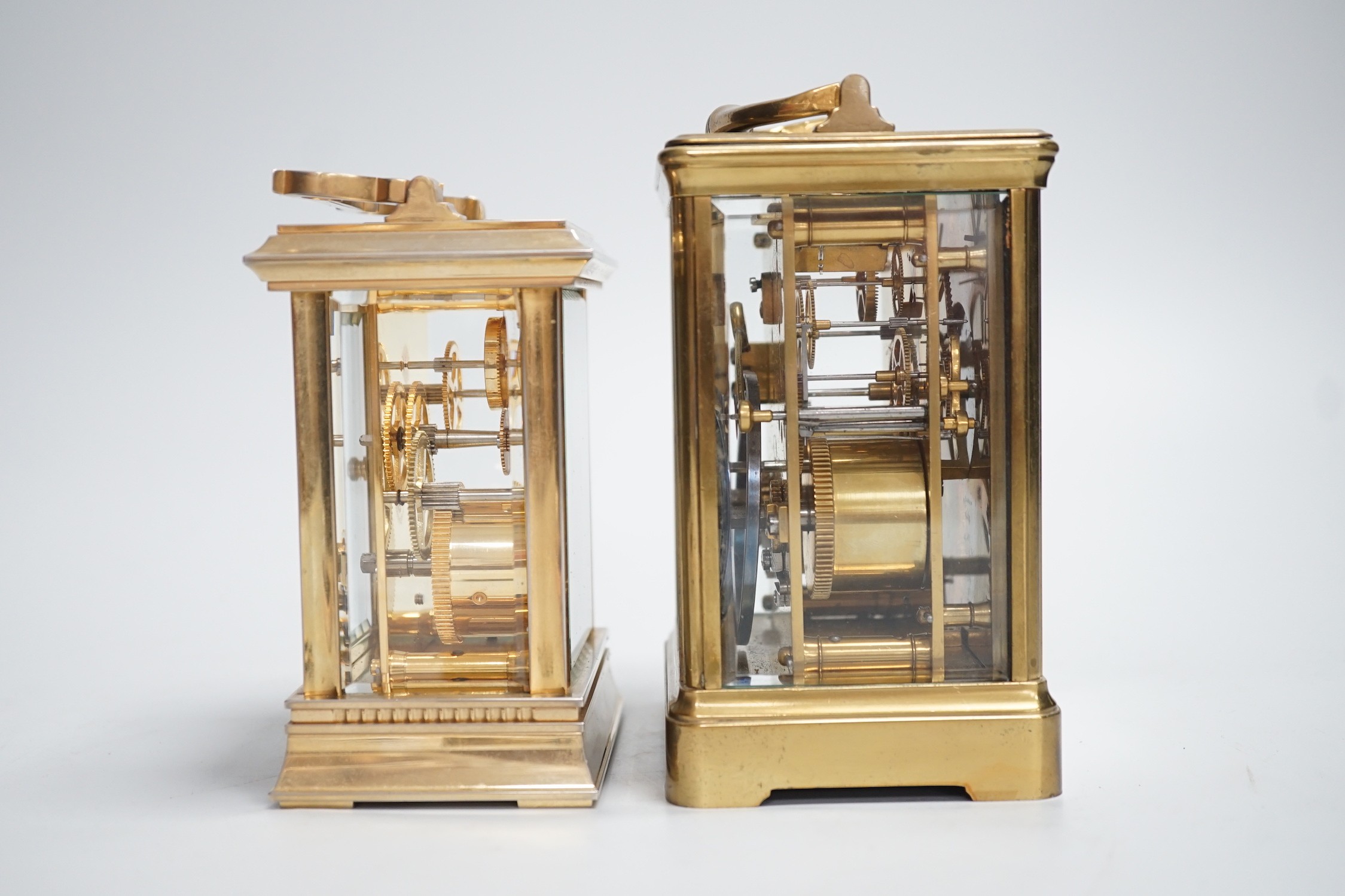Two English brass carriage clocks with winding keys. Tallest 14.5cm